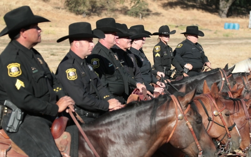 San Joaquin County Sheriff's Mounted Patrol Deputies sit on their horses